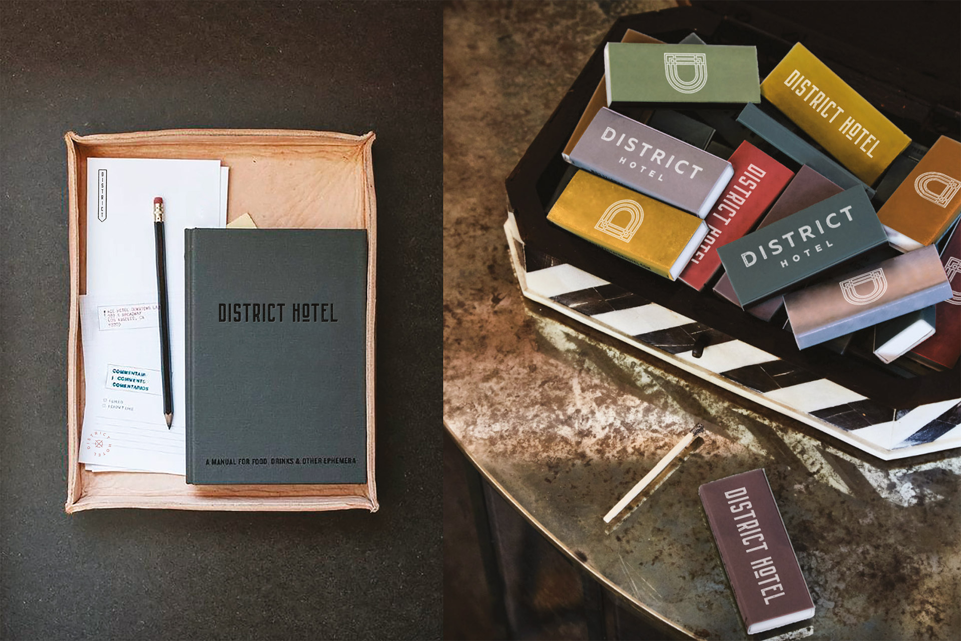 Dark grey notebook with the District Hotel logo and boxes of matches with the logo. 