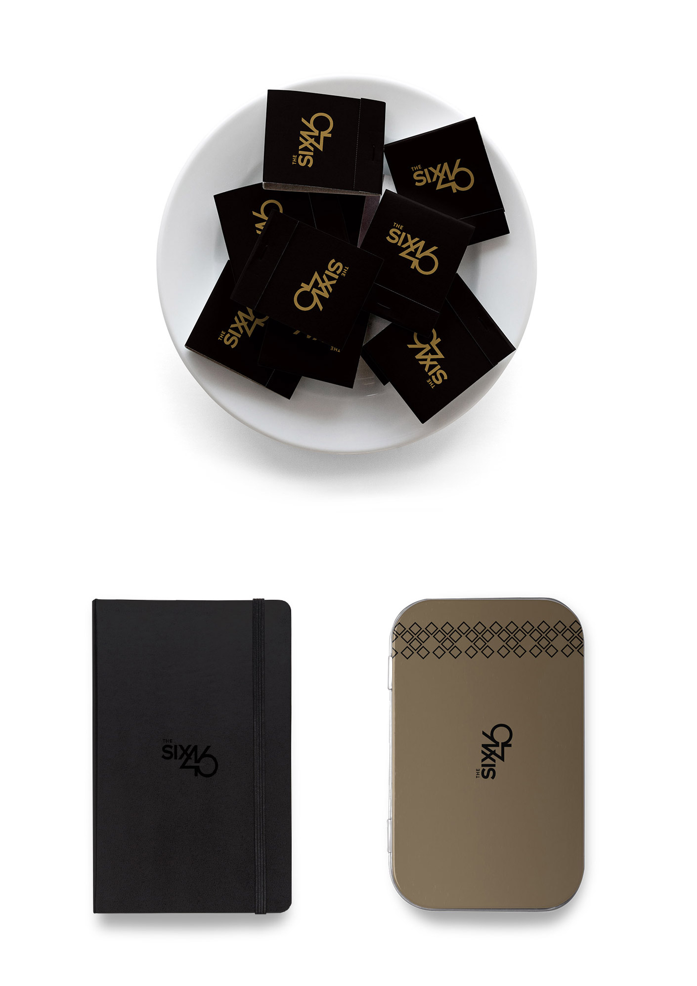 Matches in a bowl, a black notebooks, and a tablet cover with the Six46 logo.